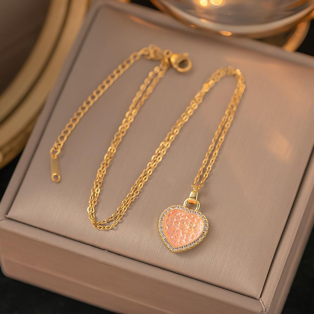 Collares acero inoxidable · collar de corazón dorado