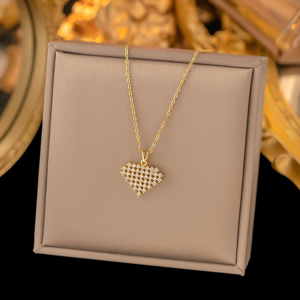 Collares acero inoxidable · collar de corazón dorado